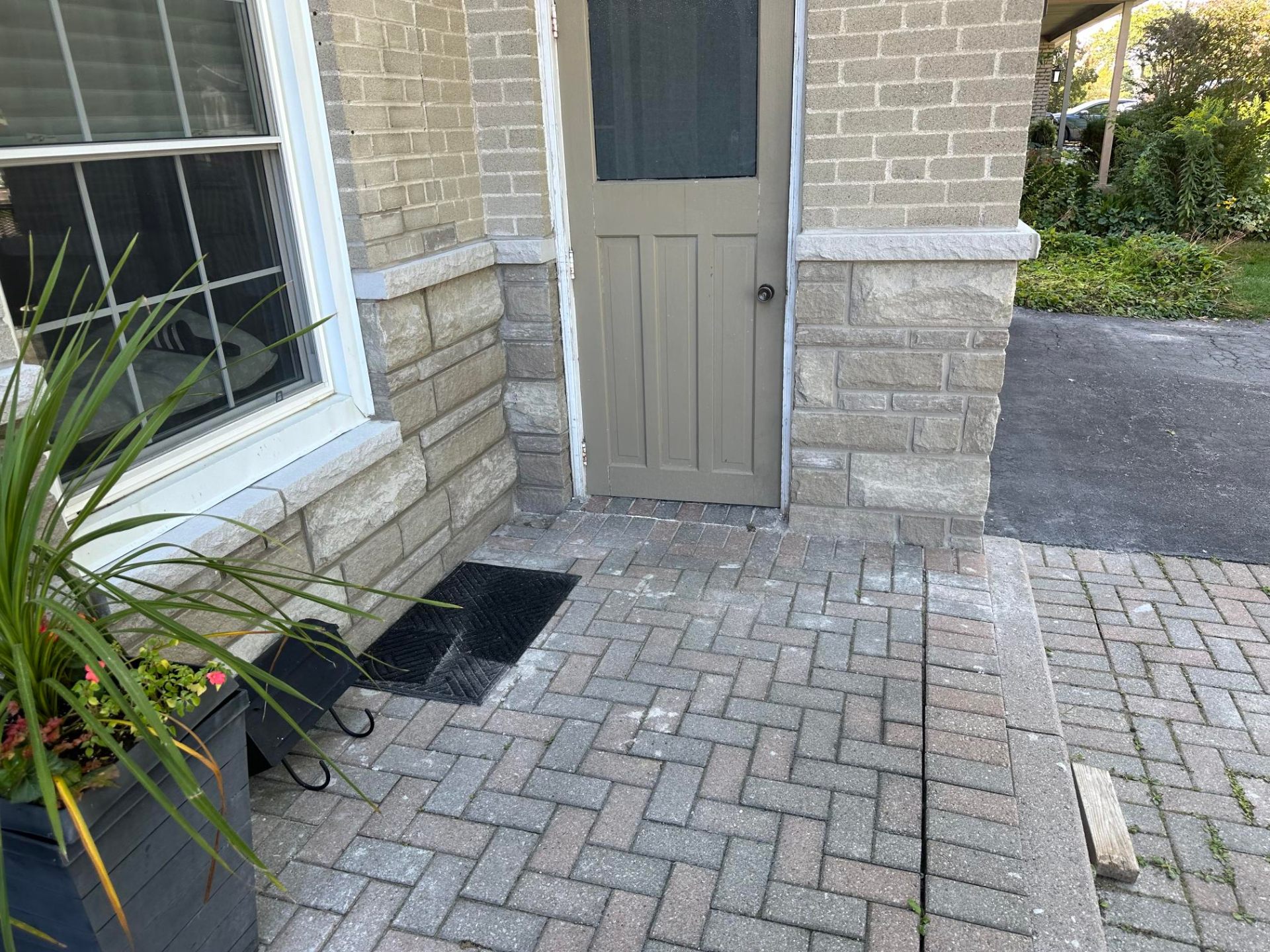 Historic brick paver repair with colour-matched mortar in Markham