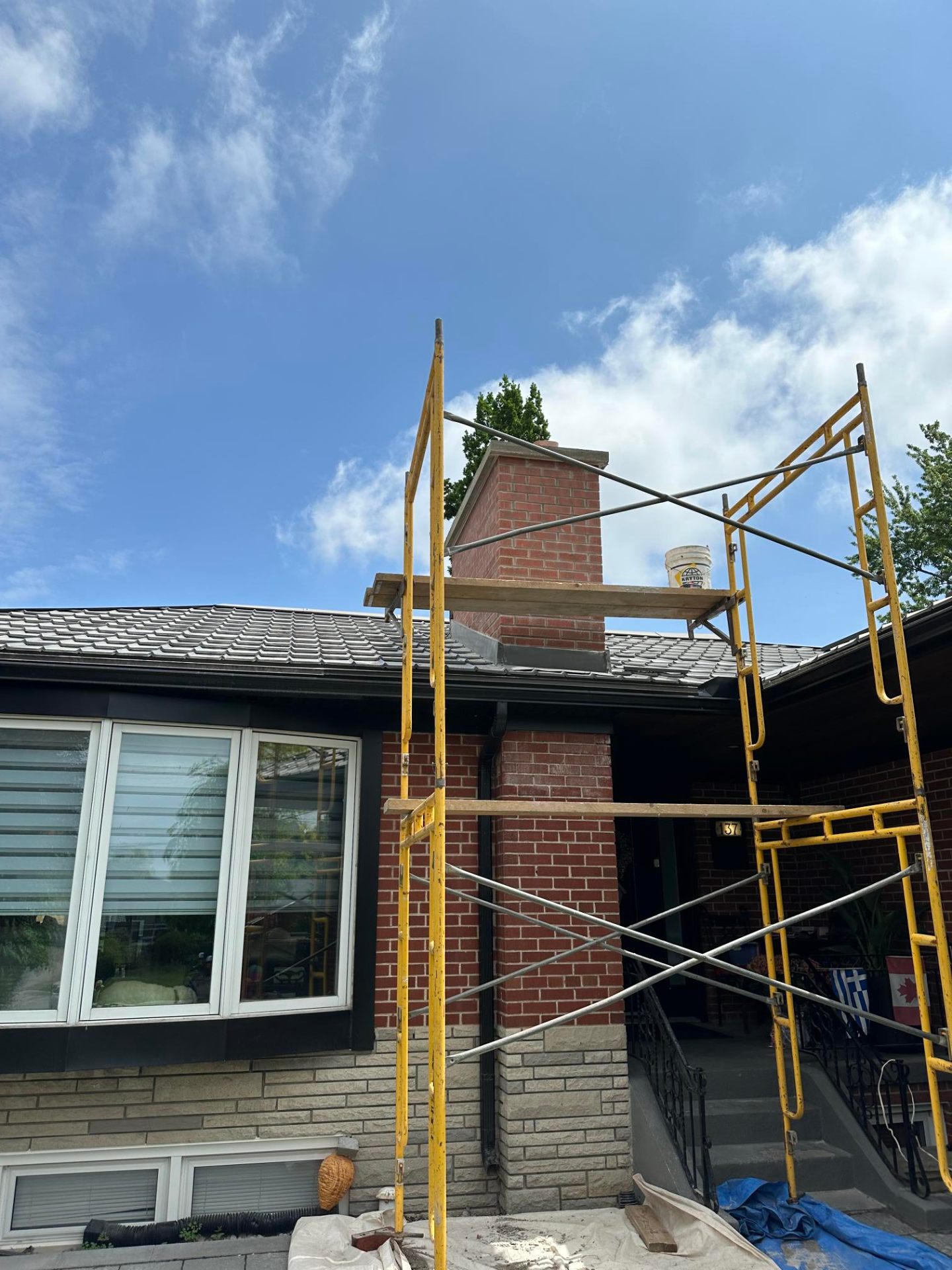 Completed Red Brick Chimney by Fadom Construction in Scarborough, ON