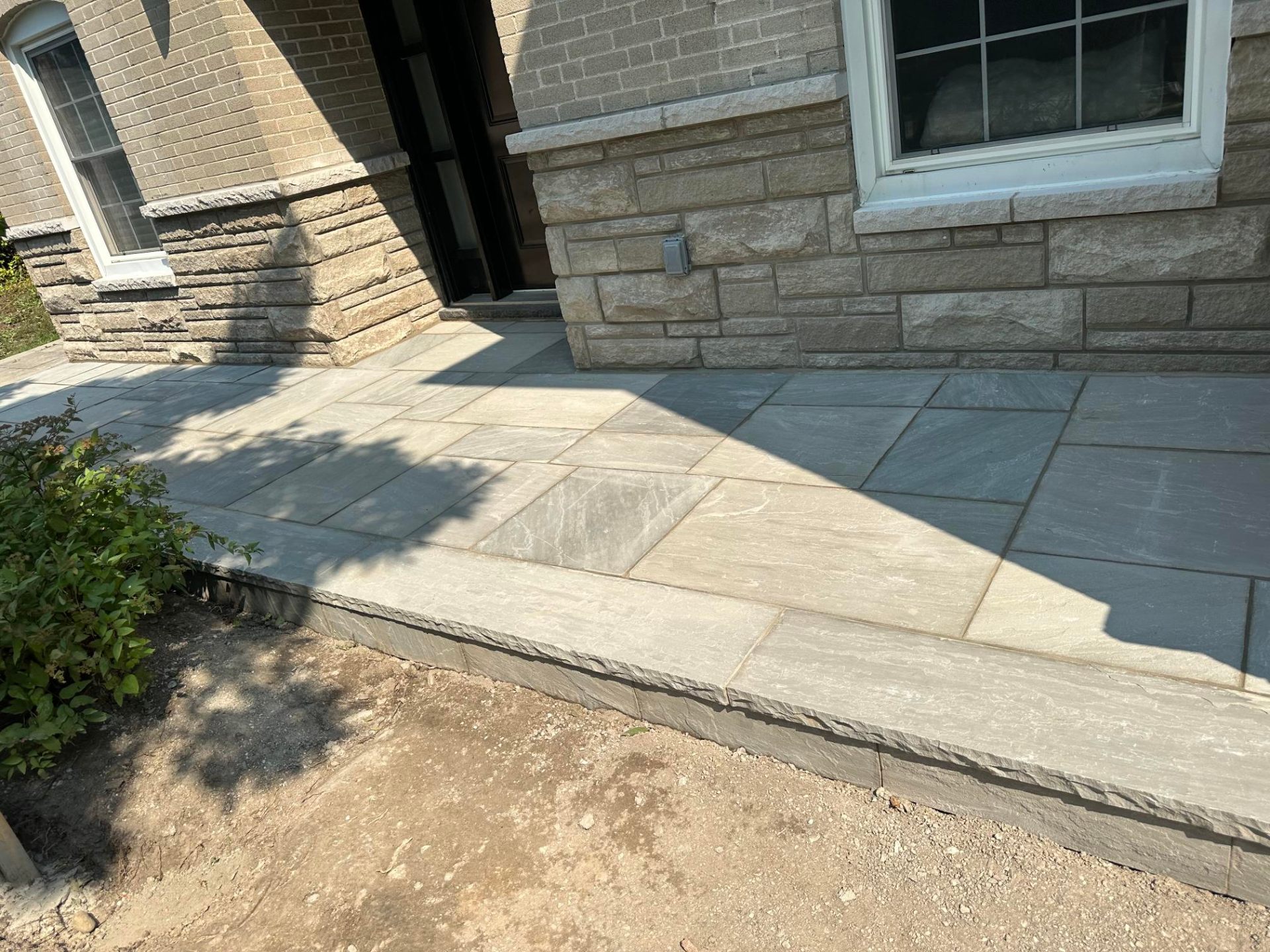 Architectural natural stone flagstone entry facade in Richmond Hill