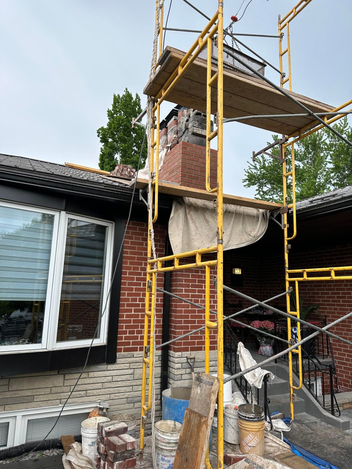 Chimney Rebuild Above Roofline by Fadom Construction in East York, ON